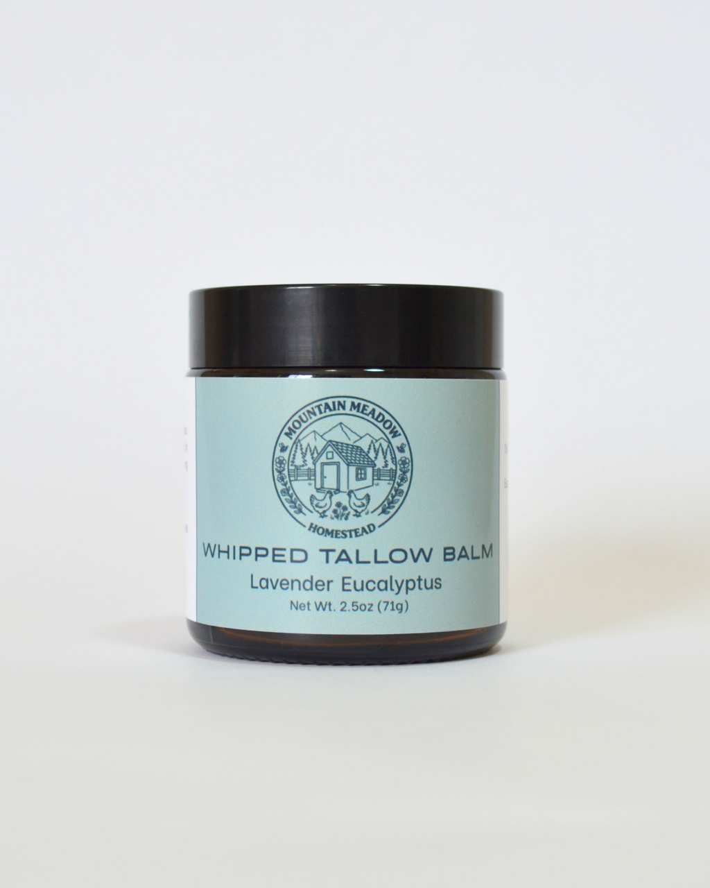 Lavender Eucalyptus Whipped Tallow Balm Front View. Amber Jar with black lid and light green label