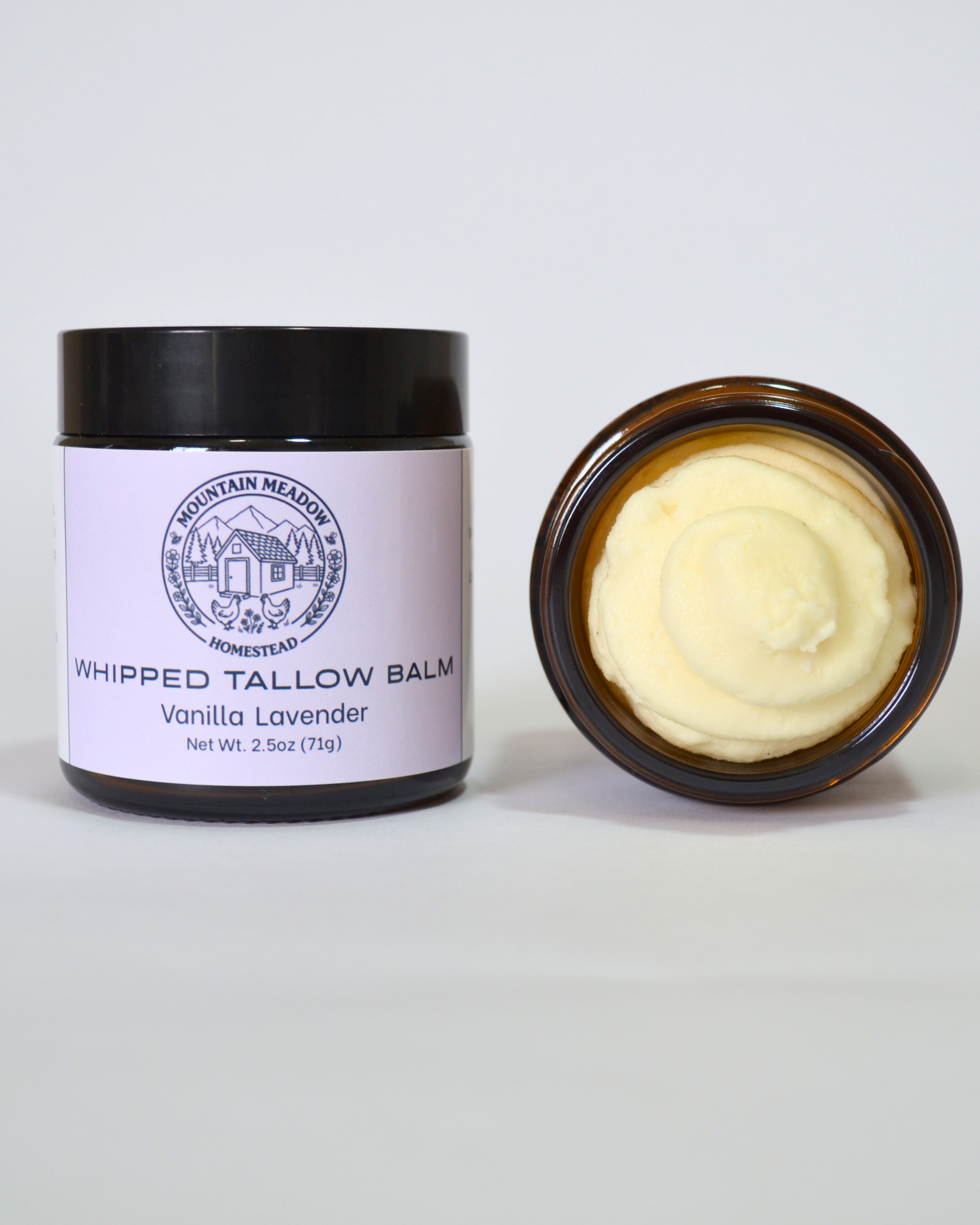 Vanilla Lavender Whipped Tallow Balm inside View. Amber Jar with black lid and  light Purple label. Creamy Tallow Balm